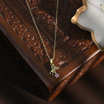 Golden Little Bear Pink Star Zircon Pendant